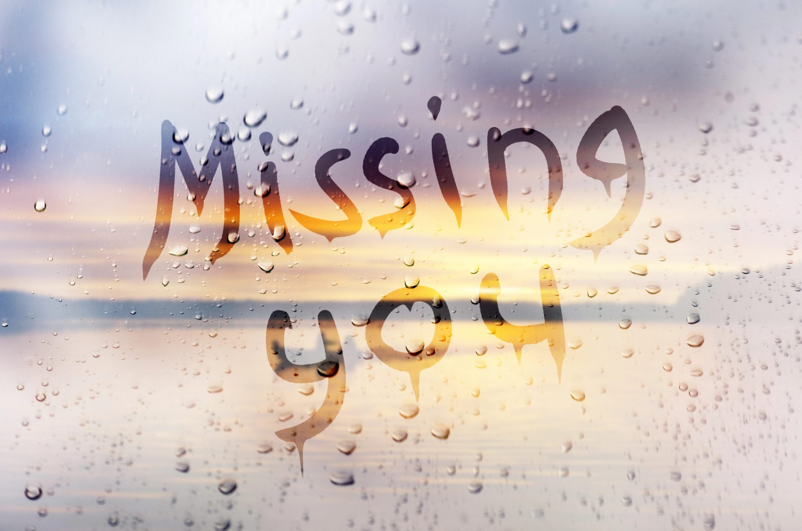 Missing You on Window for web@2x Missing you written on window for sadness and loss of person or feeling